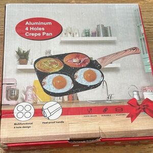 Source Unknown Black 4-Hole Aluminum Crepe Pan with Wooden-Style Handle